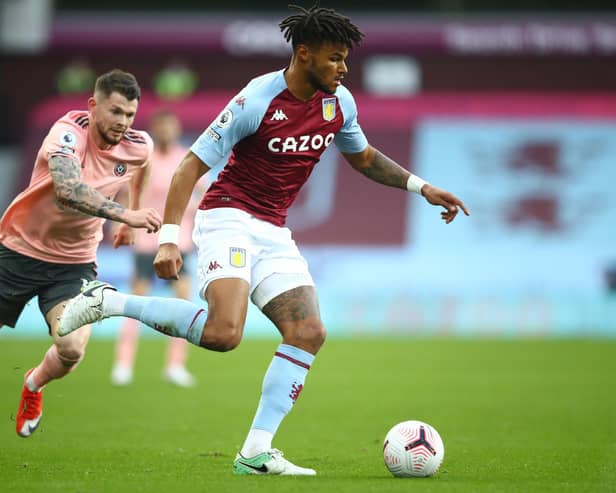 Burke gives chase at Aston Villa.  Photo: Getty Images