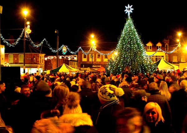 The Christmas tree and lights glow in the town centre in November 2017 at the annual switch-on event EMN-200610-151402001