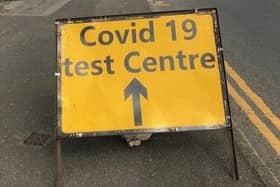 A sign on Burton Road bridge flagging up a recent Covid-19 test site in Melton EMN-201210-180723001