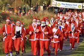 The Santa Fun Run in full swing in Melton Country Park last December 
PHOTO: Tim Williams EMN-201022-121224001