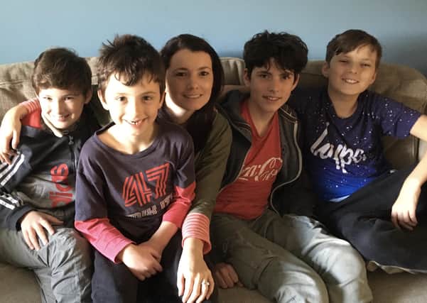 Helen Cliff with her four children - two of whom were born at Melton's St Mary's Birth Centre and the other two she received valuable after-care with after their birth - from left: Ethan (11), Lucas (7), Jacob (15) and Tom (13) EMN-201028-153559001