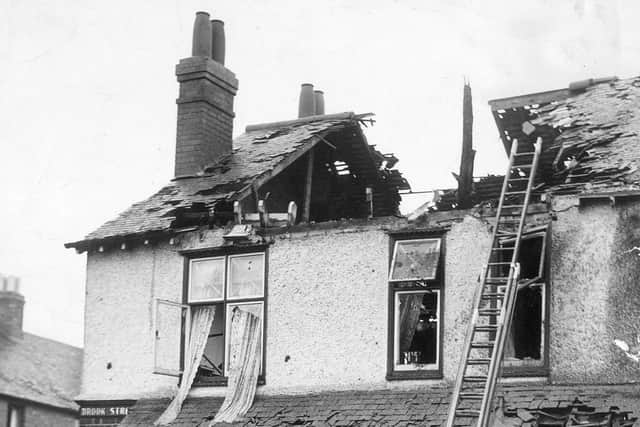 The remains of the tree that was blasted into 1 Brook Street, Melton, protrude through the roof. The occupants had a lucky escape. EMN-200211-181740001