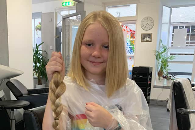 Abigail Eaves who has raised money for the Little Princess Trust by having her long hair cut EMN-200311-110813001