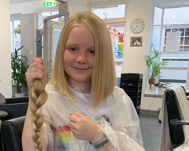 Abigail Eaves who has raised money for the Little Princess Trust by having her long hair cut EMN-200311-110813001