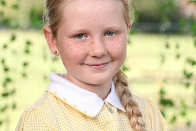 Abigail Eaves who has raised money for the Little Princess Trust by having her long hair cut EMN-200311-110803001