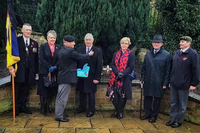 Members of the Royal British Legion and Melton Town Estate chair of feoffees, John Southerington, in the Memorial Gardens to launch the local Poppy Appeal this year EMN-200311-101809001