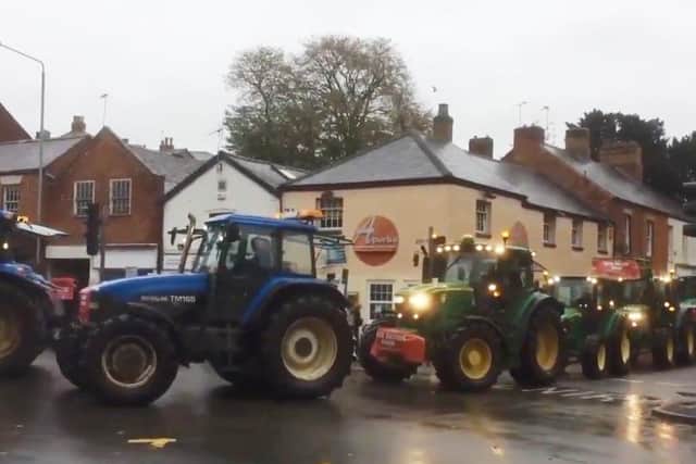 Around 30 tractors are driven through Melton to protest against the government stance on bills which they say will ditch UK animal welfare and environmental standards for imported food EMN-200411-083618001