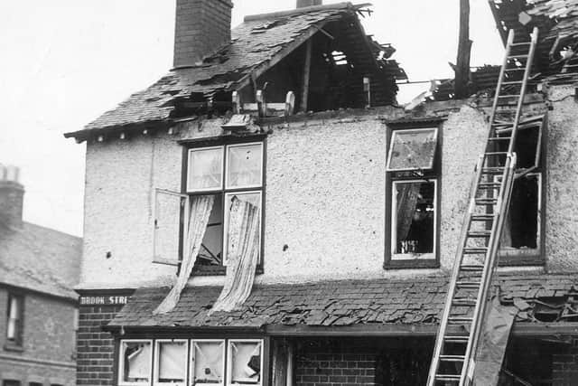 The remains of the tree that was blasted into 1 Brook Street, Melton, protrude through the roof. The occupants had a lucky escape. EMN-200211-181740001