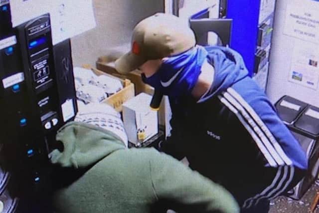 These are the suspects caught on CCTV when burglars broke into the milk vending shed at Vine Farm Dairy at Great Dalby last night EMN-200611-160007001