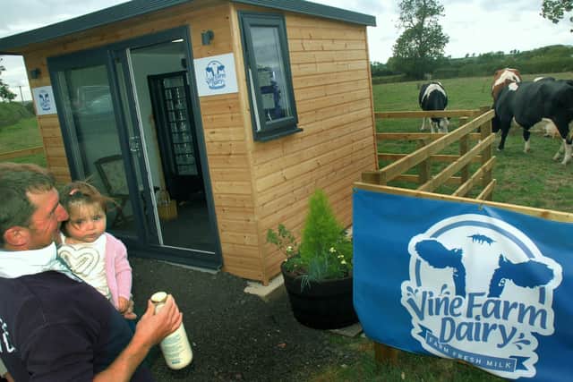 The milk vending machine at Vine Farm, Great Dalby, and the dairy herd in the background - pictured before the damage was caused by the break-in EMN-200611-100158001