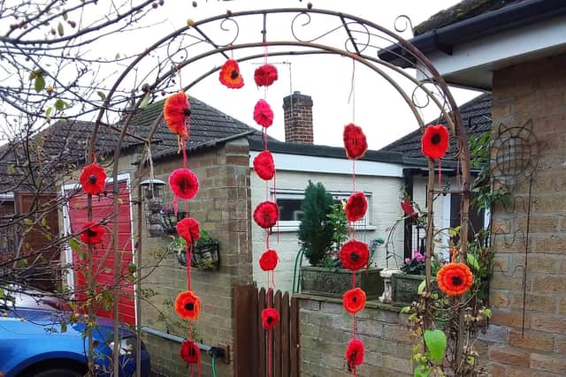 A commemorative Remembrance archway at the Melton home of Margaret Hill, who wrote a book based on her grandfather's service in the First World War EMN-200911-152348001
