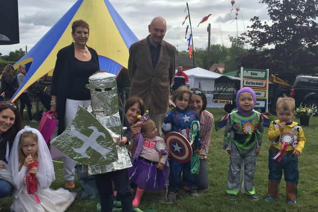 Winning knight Joshua Nicholson with children who entered the fancy dress competition at Old Dalby Day in 2018 PHOTO: Jim Patman EMN-201011-113011001