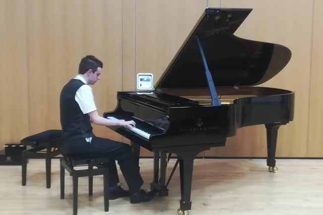 Melton teenager Thomas Corden, who is a finalist in the Lord-Lieutenant of Leicestershire's Awards for 2020, pictured during a piano performance EMN-201117-152818001
