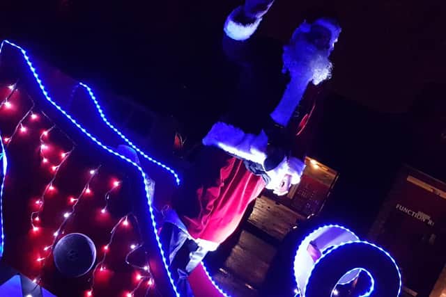 The Melton Mowbray and District Round Table's Santa float has raised more than ?1,700 for local charitable causes PHOTO: Supplied EMN-161229-145528001