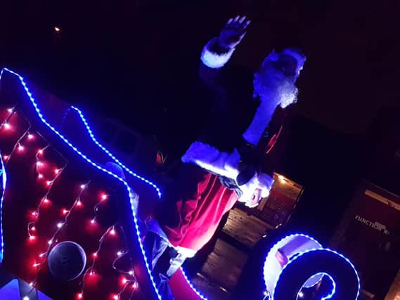The Melton Mowbray and District Round Table's Santa float has raised more than ?1,700 for local charitable causes PHOTO: Supplied EMN-161229-145528001
