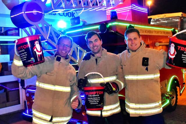 Firefighters Brent Penniston, Mark Bean and Matt McMullan with Melton's Trumpton Fire Engine last year
PHOTO: Tim Williams EMN-200912-172049001