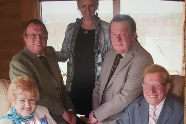The late Jim Posnett pictured on his 90th birthday with wife Doreen, their daughter Amanda and sons Anthony and Gareth EMN-201213-140523001