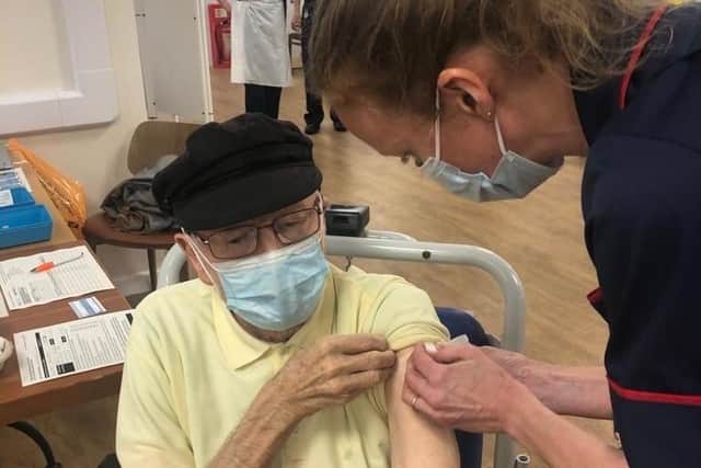 David Brindley (87) pictured becoming the first Leicestershire patient to receive the fully-tested and approved Covid vaccine at Leicester General Hospital on Saturday morning EMN-201213-144949001