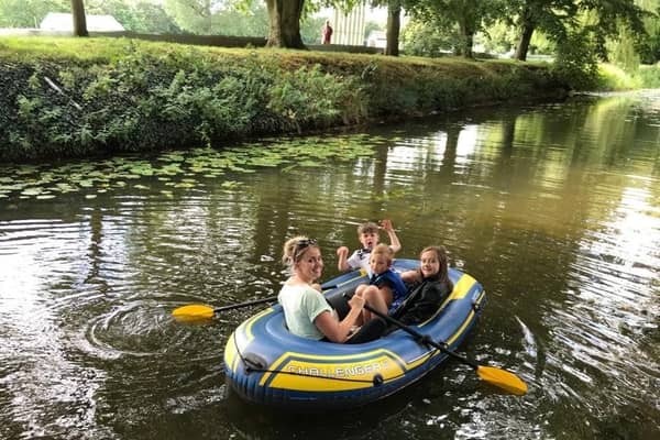 A family boating trip on the River Eye in Melton during this summer - trees are to be planted at 11 sites alongside it as part of a green initiative EMN-201214-093156001