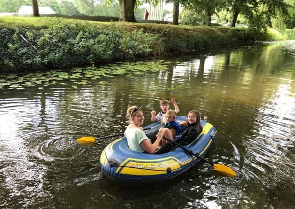 A family boating trip on the River Eye in Melton during this summer - trees are to be planted at 11 sites alongside it as part of a green initiative EMN-201214-093156001