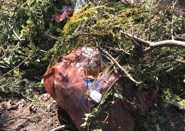 Rubbish from a Melton resident's home is discovered on local farmland - the woman involved has been fined for using an unregistered refuse collector
PHOTO MELTON BOROUGH COUNCIL EMN-201215-085506001