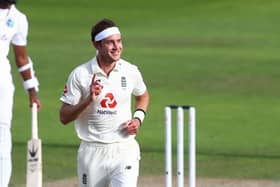 MANCHESTER, ENGLAND - JULY 26: Stuart Broad of England celebrates after taking the wicket of Kemar Roach of West Indies during Day Three of the Ruth Strauss Foundation Test, the Third Test in the #RaiseTheBat Series match between England and the West Indies at Emirates Old Trafford on July 26, 2020 in Manchester, England. (Photo by Michael Steele/Getty Images) 775534511