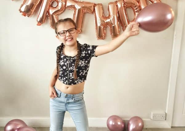 Kaci Chapman (10), who suffers from a severe form of cerebral palsy and who is planning to walk nearly five miles in aid of a children's charity EMN-201218-115538001