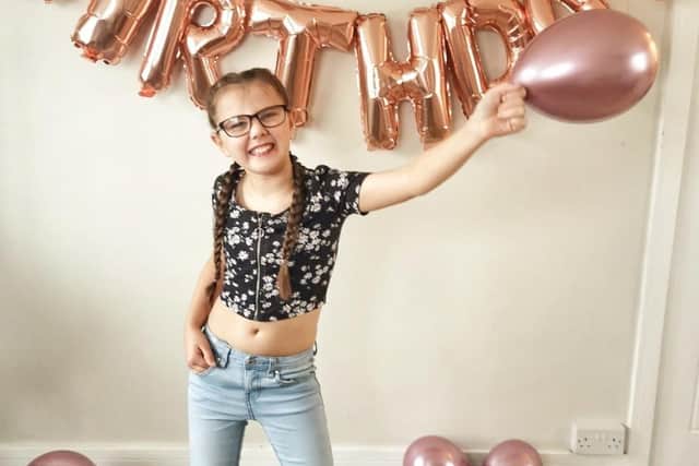 Kaci Chapman (10), who suffers from a severe form of cerebral palsy and who is planning to walk nearly five miles in aid of a children's charity EMN-201218-115538001