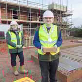 Mayor of Melton, Malise Graham, with McCarthy and Stone’s area sales manager, Andrea Shaw and Paul Bardon, senior site manager, as he lays the first brick in a major new retirement housing scheme off Scalford Road EMN-201218-094029001