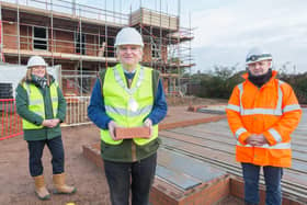 Mayor of Melton, Malise Graham, with McCarthy and Stone’s area sales manager, Andrea Shaw and Paul Bardon, senior site manager, as he lays the first brick in a major new retirement housing scheme off Scalford Road EMN-201218-094029001