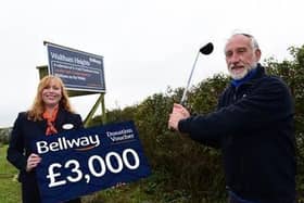 Tanya Smith, sales advisor for Bellway East Midlands, photographed with David Hirst, marketing director at Melton Mowbray Golf Club.