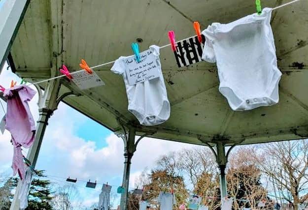 Messages of support for St Mary's Birth Centre and and baby grows left by campaigners at the Melton Bandstand on Sunday EMN-201222-104627001