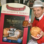 Managing director, Stephen Hallam, shows off the revamped Dickinson and Morris Melton Mowbray pork pie outside Ye Olde Pork Pie Shoppe in Nottingham Street, Melton EMN-201222-081021001