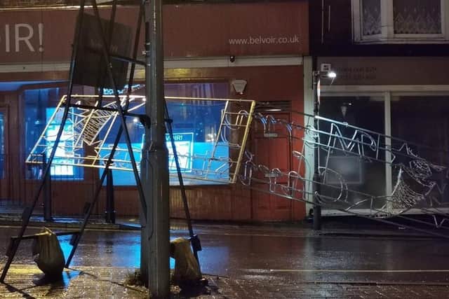 The Christmas street lights which fell on Burton Street last night (Wednesday) in high winds EMN-201224-075422001