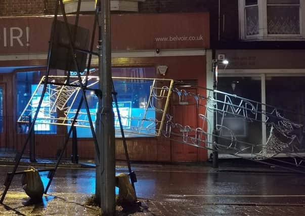 The Christmas street lights which fell on Burton Street last night (Wednesday) in high winds EMN-201224-075422001