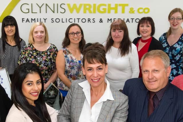 Solicitor Glynis Wright (centre, front, wearing grey suit), who lives in Melton, who has been awarded an MBE in the Queen's New Year honours list EMN-201230-112003001
