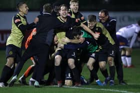 Marine players celebrate winning the match after the final whistle during the Emirates FA Cup Second Round contest against Havant and Waterloovile. Photo: Getty Images