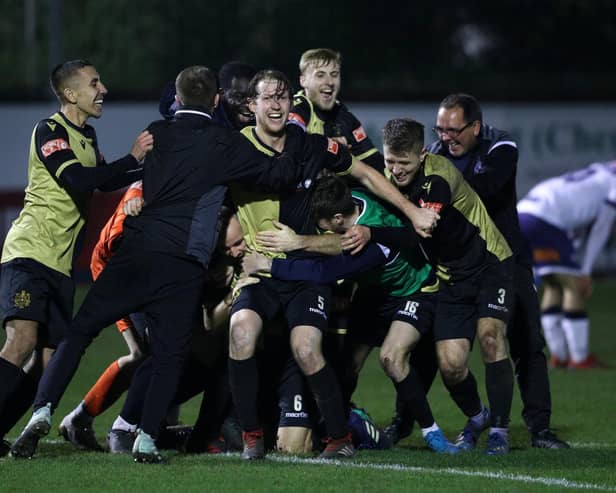 Marine players celebrate winning the match after the final whistle during the Emirates FA Cup Second Round contest against Havant and Waterloovile. Photo: Getty Images