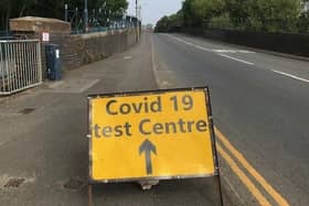 A sign on Burton Road bridge flagging up a Covid-19 test site in Melton EMN-210501-083904001