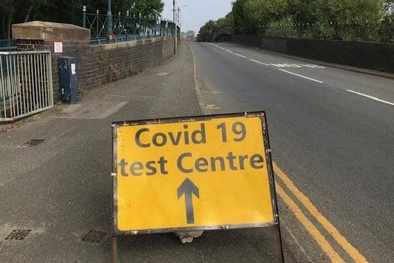 A sign on Burton Road bridge flagging up a Covid-19 test site in Melton EMN-210501-083904001