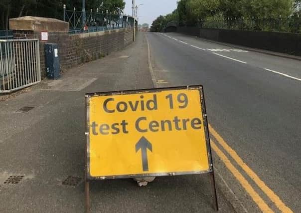 A sign on Burton Road bridge flagging up a Covid-19 test site in Melton EMN-210501-083904001