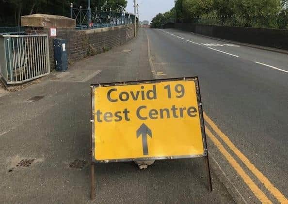 A sign on Burton Road bridge flagging up a Covid-19 test site in Melton EMN-210501-083904001