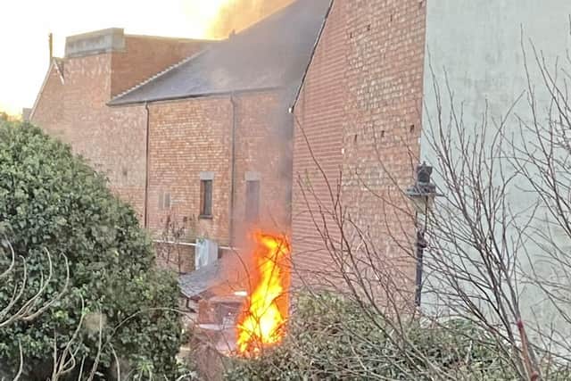 The blazing shed at the rear of The Cutting Room pub, in Melton, which firefighters were alerted to
PHOTO HAZEL PATERSON EMN-210601-161817001