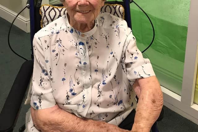 A happy resident of The Amwell care home in Melton after receiving a Covid vaccination EMN-210113-091528001