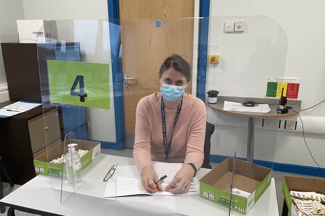 A member of the Covid testing team at Long Field Academy in Melton EMN-210120-121745001