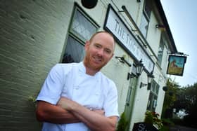 Dom Clarke outside The Stag and Hounds pub at Burrough on the Hill