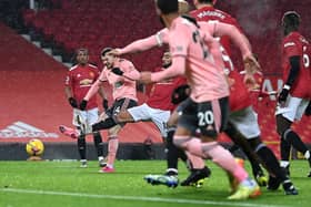 Burke fires home the winner. Photo: Getty Images