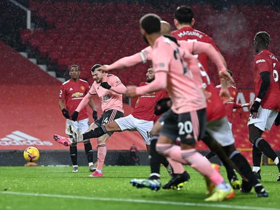 Burke fires home the winner. Photo: Getty Images