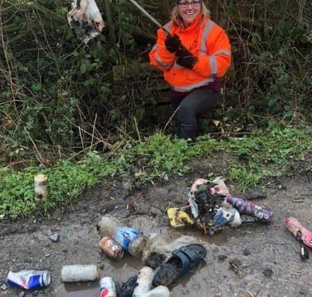 A clean up by Melton Wombles following yet more fly-tipping of rubbish in a borough layby EMN-210302-133542001