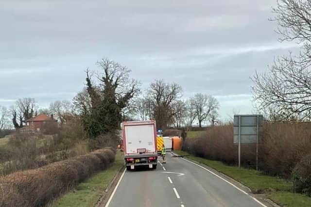 The bin lorry on its side on the A607 near Frisby this lunchtime

PHOTO PETER OMMIS EMN-210223-132005001